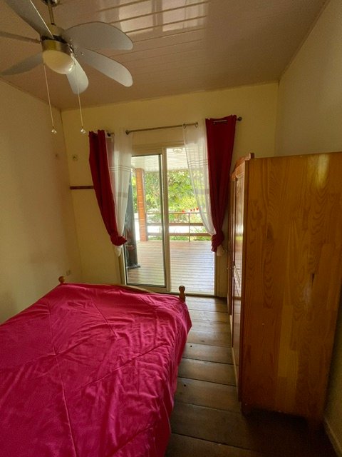 Chambre donnant sur la véranda